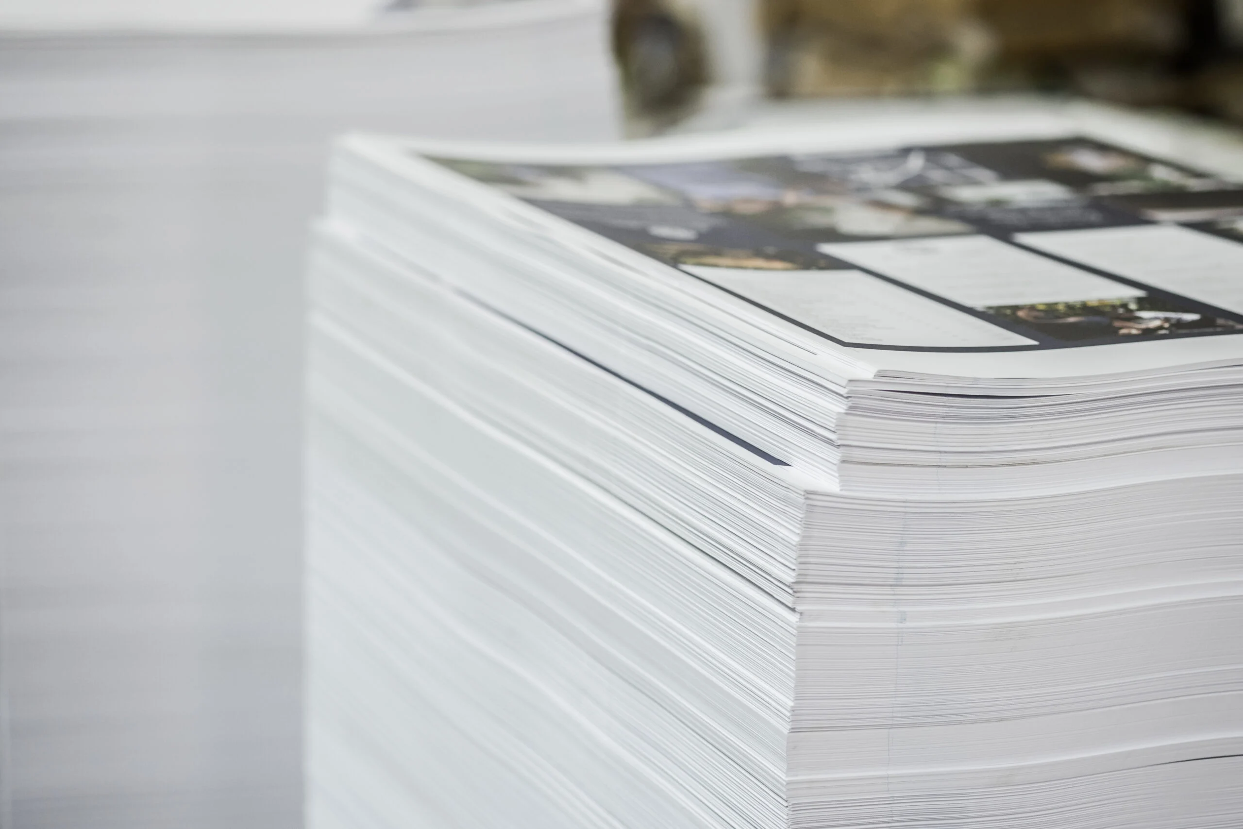 stack of paper flyers printing